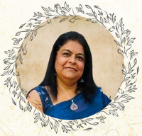 Woman in a blue saree with a decorative frame