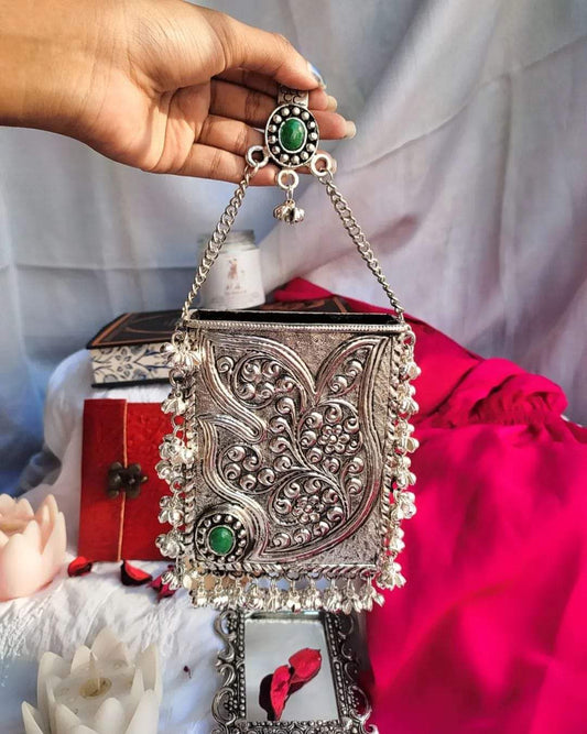 silver brass handbag with intricate designs