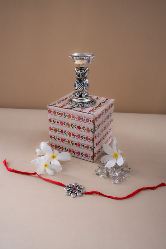 Auspicious owl candle holder