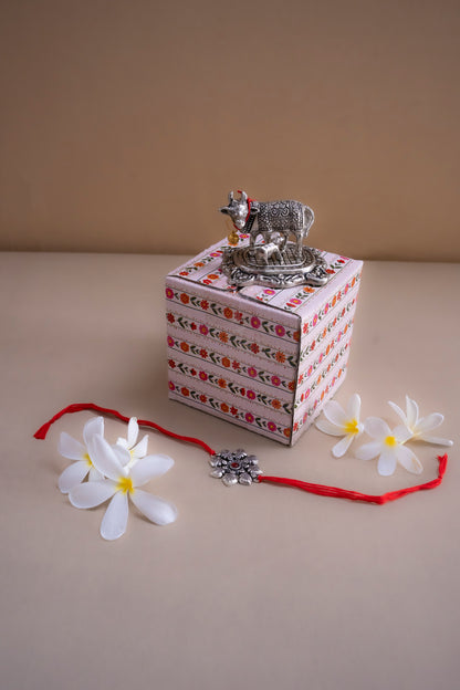 Kamdhenu Idol with calf with rakhi