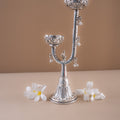 Silver plated candle holder with decorative bells