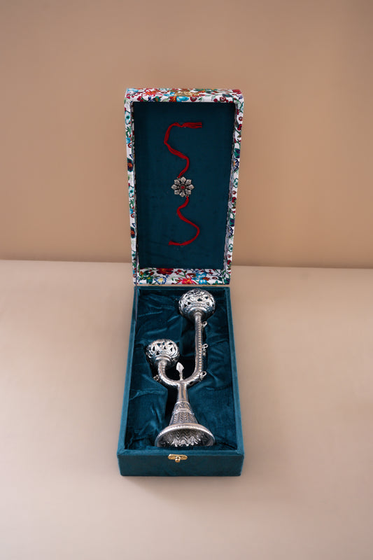 Silver plated candle holder with decorative bells