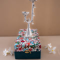 Silver plated candle holder with decorative bells