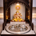 Decorative Ganesh idol in a ornate wooden frame with a marble base.