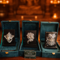 999 pure silver idol frames of Ganesha, Krishna, and Balaji in premium green velvet gift boxes