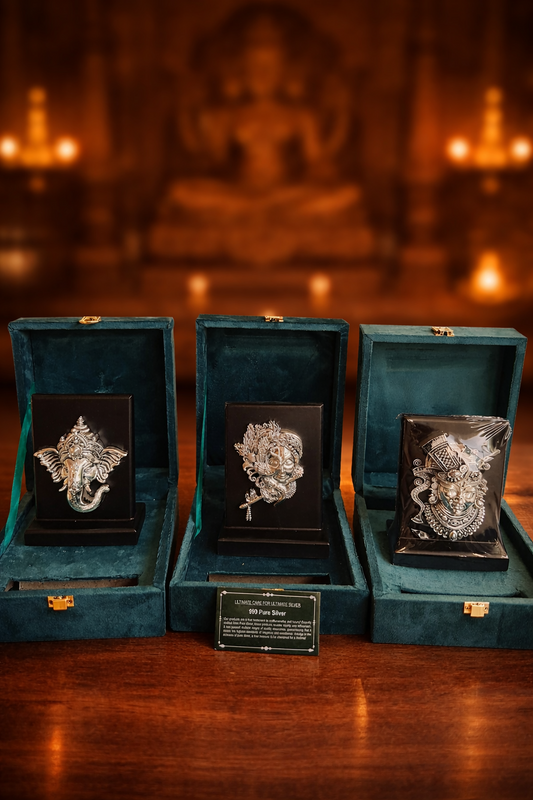 999 pure silver idol frames of Ganesha, Krishna, and Balaji in premium green velvet gift boxes