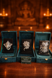 999 pure silver idol frames of Ganesha, Krishna, and Balaji in premium green velvet gift boxes