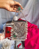 silver brass handbag with intricate designs