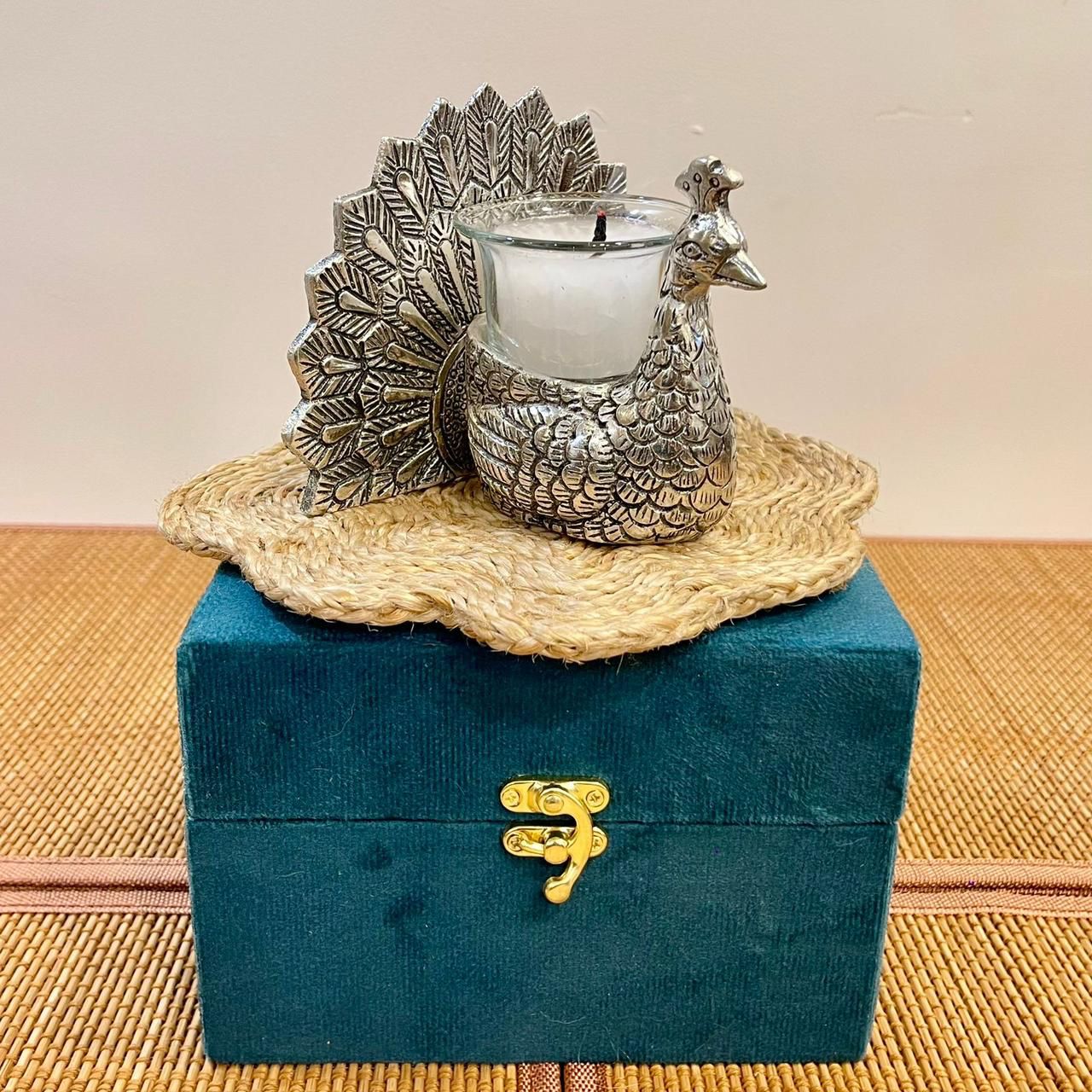 silver brass peacock-shaped candle holder