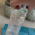 Fancy Glass Bottle With German Silver Coating In Velvet Box