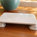 Video for Decorative stone platform with silver bases on a wooden surface