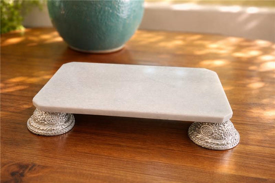 Video for Decorative stone platform with silver bases on a wooden surface
